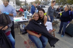Look at all those smiles in this photo as the homeless get their haircut, facial and more on Easter.