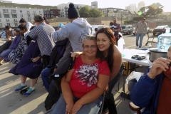 Tammy cuts another homeless women's hair for our Easter Homeless event.
