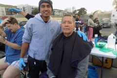 Look how sharp the homeless man looks after having his hair cut!