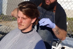 Our homeless friend Gordy getting his hair cut.