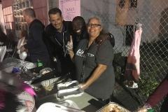 All smiles feeding the homeless in downtown San Diego