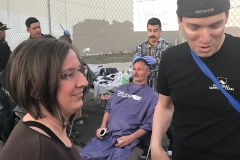 Jenn and Dan talk to the homeless while they get their haircut