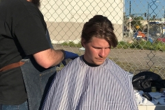 Eric finishes up Gordy's hair cut at our homeless San Diego hair cutting event