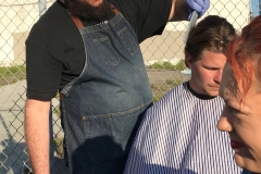 Eric cuts our homeless friend Gordy's hair on the streets downtown