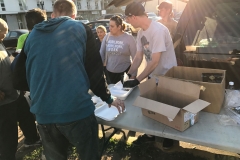 Feeding the homeless some appetizers before the big meal is served