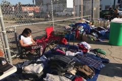 Some of the clothing being set up for San Diego's homeless