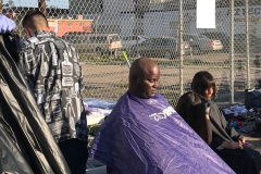 Cutting the homeless hair downtown San Diego