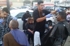 Mario and Jose from the Country Club Barber Shop give San Diego's homeless a professional haircut!