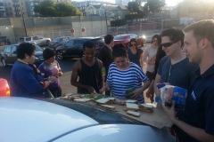 Getting the ham sandwiches ready for serving San Diego homeless