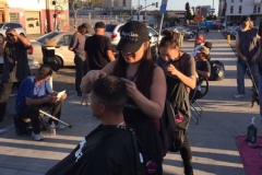 Tammy cutting hair on Easter San Diego homeless event