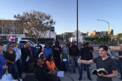 Dan telling a joke during Easter homeless service event - look at those smiles; it must have been a good one!