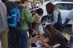 Passing out clothes to the homeless on Easter