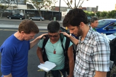 Parker, John praying for Jose who is homeless in San Diego