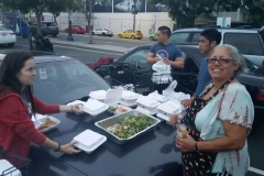 Christina and friends putting the final touches on a hot meal for San Diego's homeless community