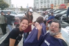 All smiles cutting the hair of San Diego's homeless