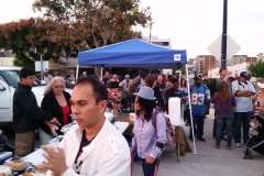 View of the food station, massage station and the clothing donation station for San Diego's homeless.