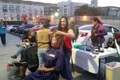Tammy all smiles while cutting hair downtown for San Diego's homeless.