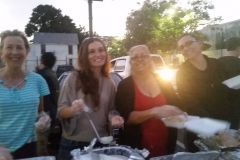 Karen, Marta, Christina and Tammany are all smiles while serving food to the homeless in San Diego.