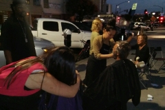 Tammy hugging a homeless woman after she cut her hair.