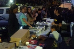 Marta, Karen and other volunteers making dinner for the homeless.