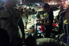 Passing out clothing donations and shoes to San Diego's homeless.