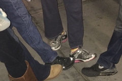 Homeless women shoes off her new sneakers as we all join in!