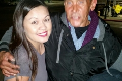 San Diego homeless man giving Tammy a hug after she cut his hair on Thanksgiving.