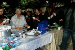 Tammy, Christina, Jenn and others passing out hot food and hot drinks to San Diego's homeless at our Thanksgiving event.