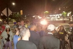 Eric read and teaching from the bible before serving food to San Diego's homeless.
