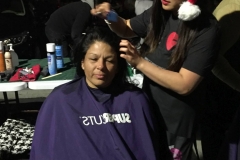 Tammy starts to cut a homeless women's hair - BEFORE PHOTO.