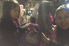 Little homeless girl Rickie loves her Spiderman backpack and blanket from Arul.