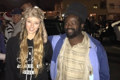 A homeless man hugs a Streets of Hope San Diego volunteer downtown.