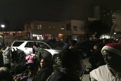 San Diego's homeless wait for their name to be called for new shoes and clothes during Christmas.