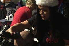 Part 3 - Tammy cutting a homeless man's hair during the Streets of Hope Christmas event.