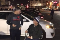 David, the Streets of Hope homeless massage therapist, talks to a homeless man.