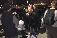 Nate talking to a homeless San Diego man at the Streets of Hope Christmas Event.