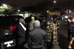 Getting ready to pass out food to the homeless downtown in the rain.