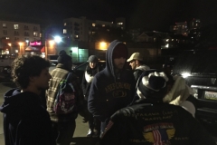 Joe talks to a homeless person about the cold and rain in downtown San Diego.
