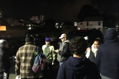 Still smiling while passing out food to San Diego's homeless this Monday night.