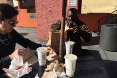 Celebrating Milton getting off the streets of San Diego with a Taco Bell feast.