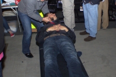Dr Jeremy gives a homeless man an adjustment right on the streets.