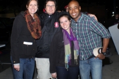 Anne, John, Jenn and Eliezer hug after spending the night with San Diego's homeless.