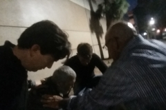 Praying for homeless man Stephen in downtown San Diego