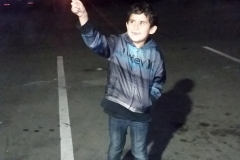 Zayden with a sparkler on the Streets of Hope San Diego downtown homeless.