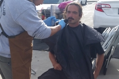 Homeless man gets his goatee cut on Easter