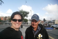 Dan gives Eddie his baseball cap at our Easter homeless event.