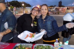 Happily passing out food to San Diego's homeless downtown for Easter.
