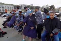 Look at those smiles of the homeless as the team cuts their hair.