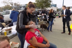 Serena gives a professional facial to a homeless woman.