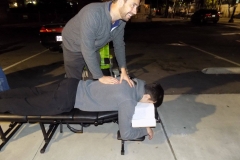 Dr. Eric does another adjustment on the Streets of San Diego